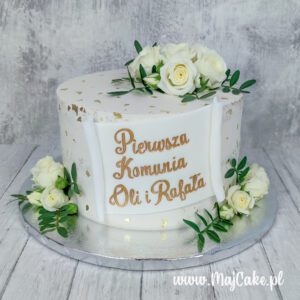 Tort komunijny semi naked z kwiatami i napisem
